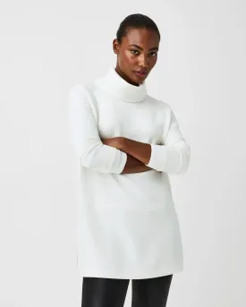 Sure! Here’s an optimized title for the product:

AirEssentials Women’s Cozy Turtleneck Tunic Top - Classic White - Perfect for Layering and Everyday Wear